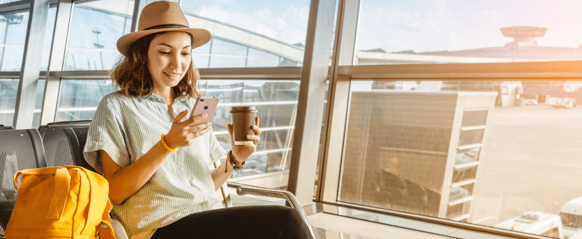 Woman sit in the waiting room at the airport