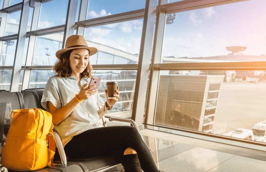 Woman sit in the waiting room at the airport