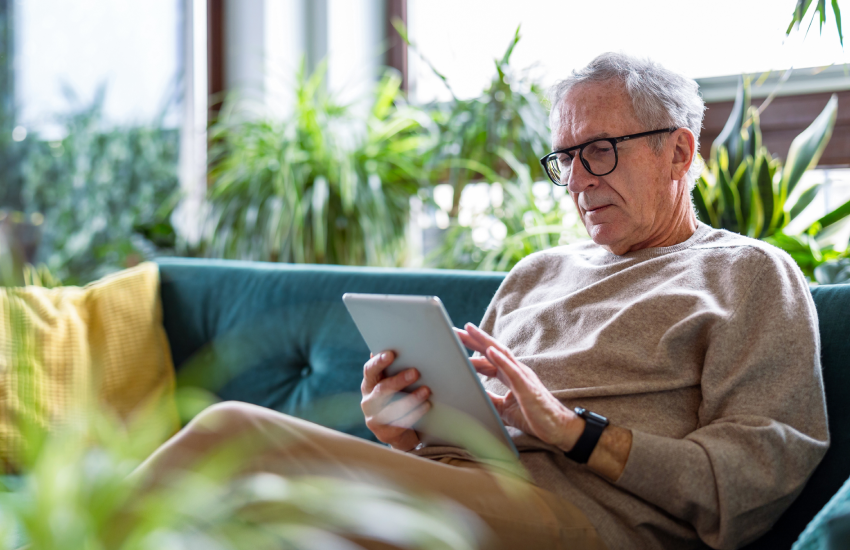 Man reading on a tablet