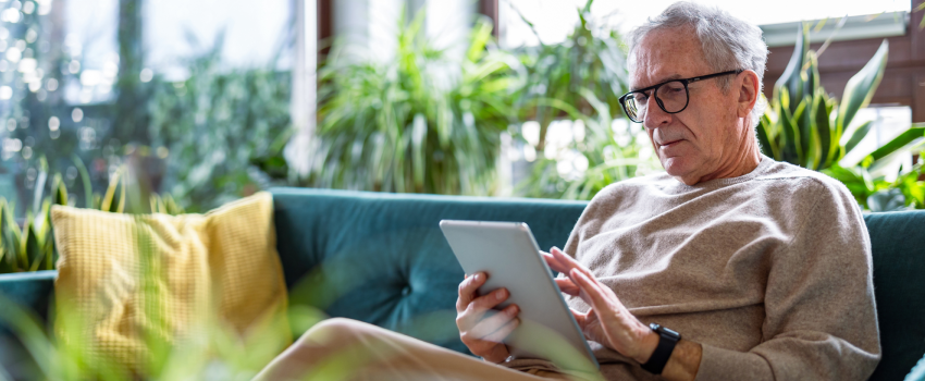 Man reading on a tablet