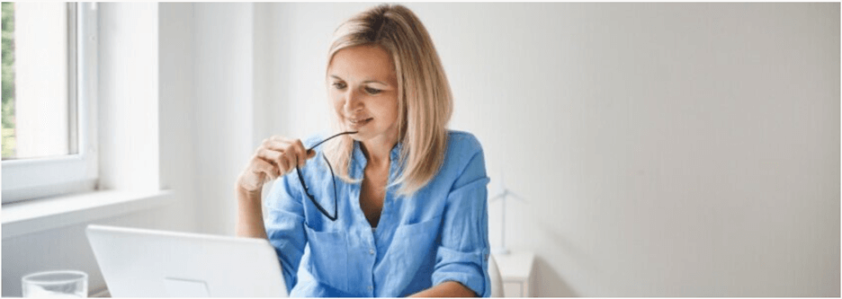 Woman watching at her laptop